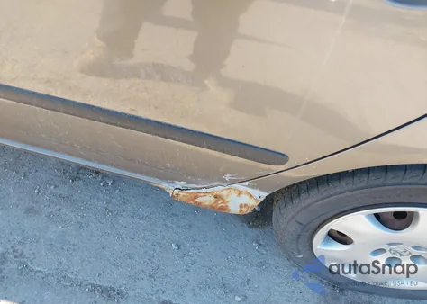 2003 Toyota Corolla Ce z USA, uszkodzony, nr VIN 2T1BR32E13C065992